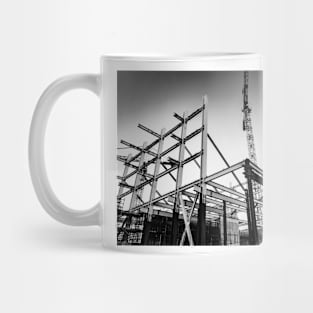 Gritty construction image of steel framing and construction crane Mug